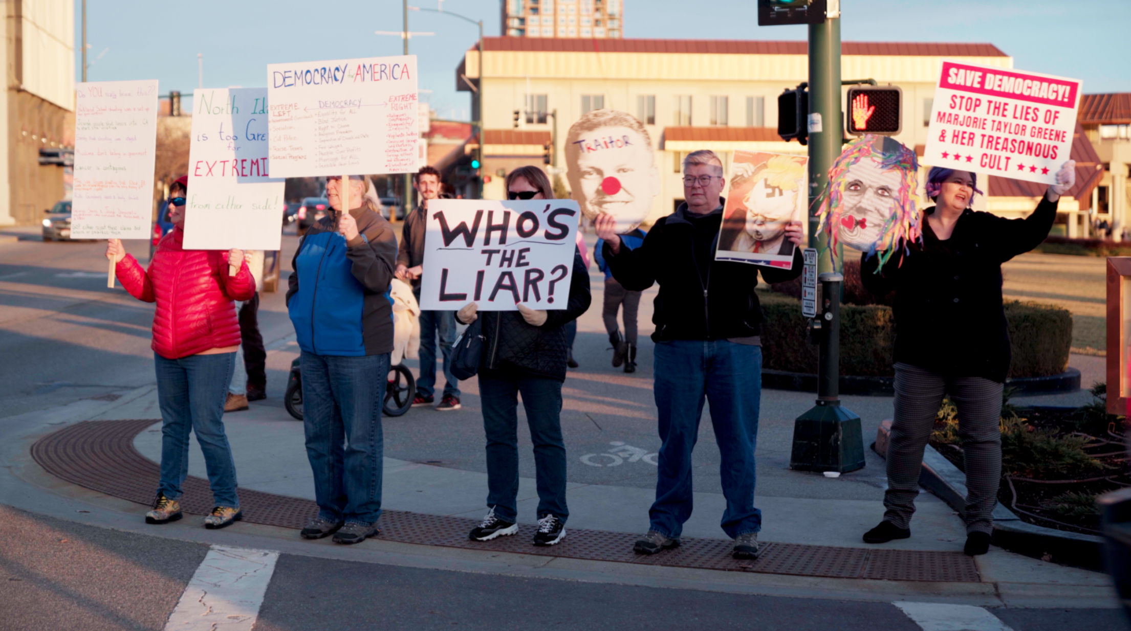 Gaggle of boomer hippie liberals, not one of them weighing less 200lbs, frightening passerby’s.